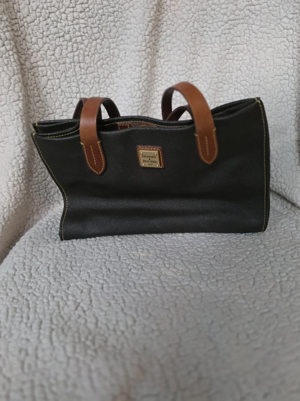 Dooney & Bourke Black Leather Tote with Brown Handles and Yellow Stitching